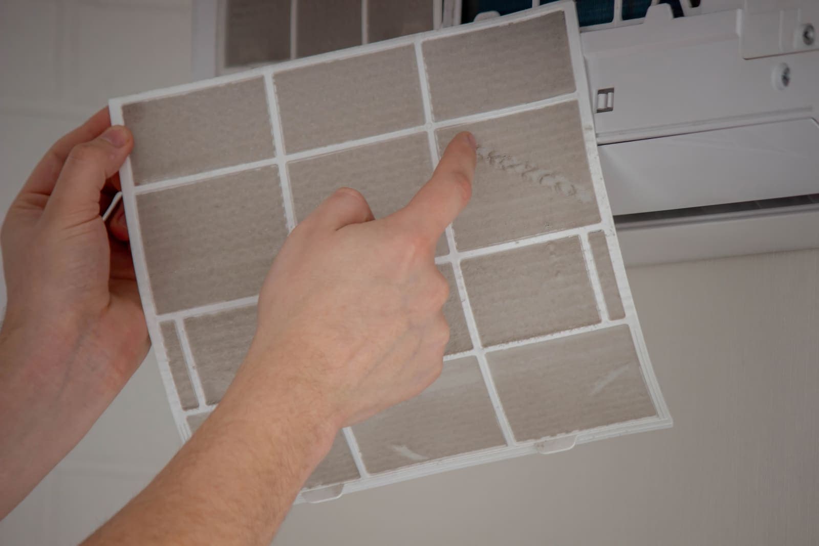 Checking a home air conditioning filter